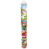 Plus-Plus Unicorn building set in a clear travel tube with colorful interlocking pieces and rainbow packaging.