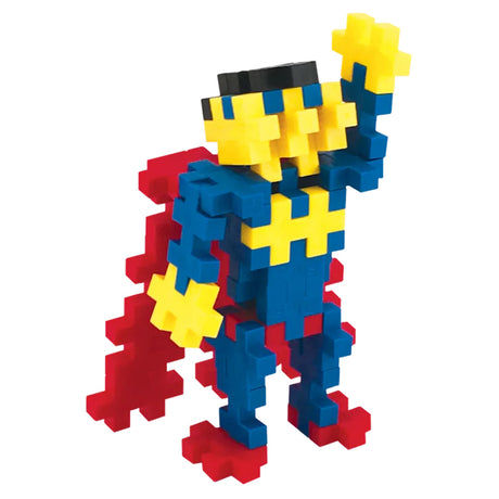 Superhero figure built with blue, red, and yellow Plus-Plus blocks, featuring a red cape and raised arm.