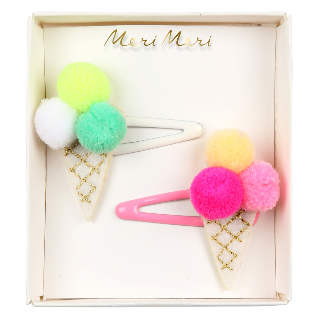Featuring fun ice cream cone shapes with colourful pom pom tops, adding a cute and whimsical flair to kids' hairstyles.