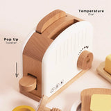 Wooden toy pop-up toaster with temperature dial and lever mechanism.