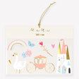 Meri Meri princess-themed temporary tattoos package with a swan, rainbow, carriage, castle, and gold string.