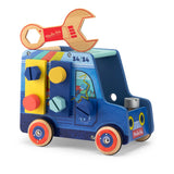 Wooden toy handyman truck with colorful bolts, wheels, and a large wrench on top from Moulin Roty.