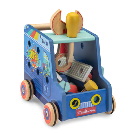 A blue wooden toy handyman truck by Moulin Roty, filled with wooden tools and featuring a wrench on top.