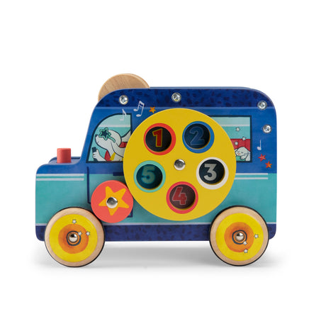 Wooden blue toy bus with a spinning yellow number wheel, red star gear, and dog character in the window.