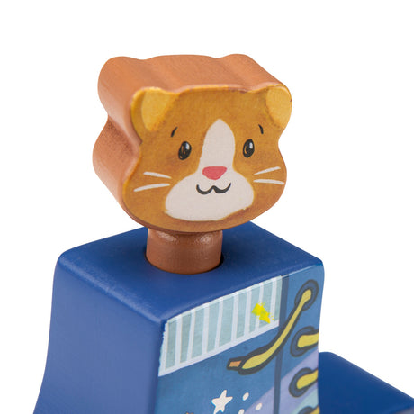 Close-up of a wooden pull-along toy featuring a small orange cat head attached to a blue base.