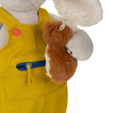 Close up of plush activity dog toy wearing yellow overalls with zippered pocket and holding a small brown mouse.