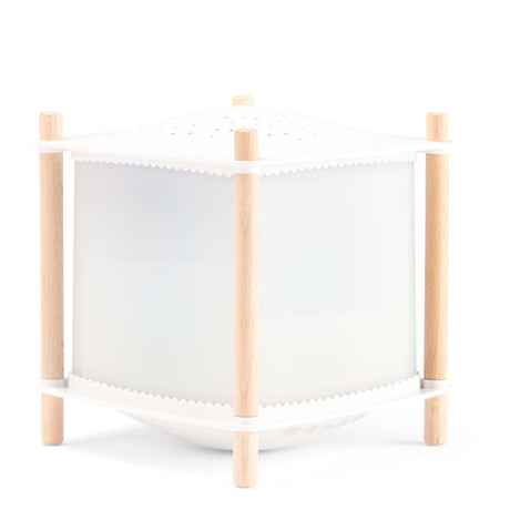 Magic lantern night light for nursery featuring a white frame, starry top, and light wood posts.