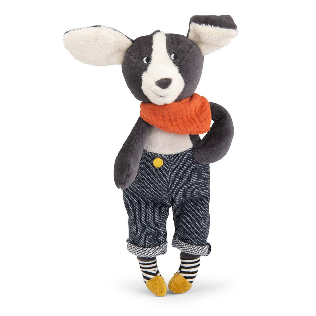Plush dog toy with a cute expression wearing blue overalls, an orange scarf, and striped socks. The toy has floppy ears and a playful look.
