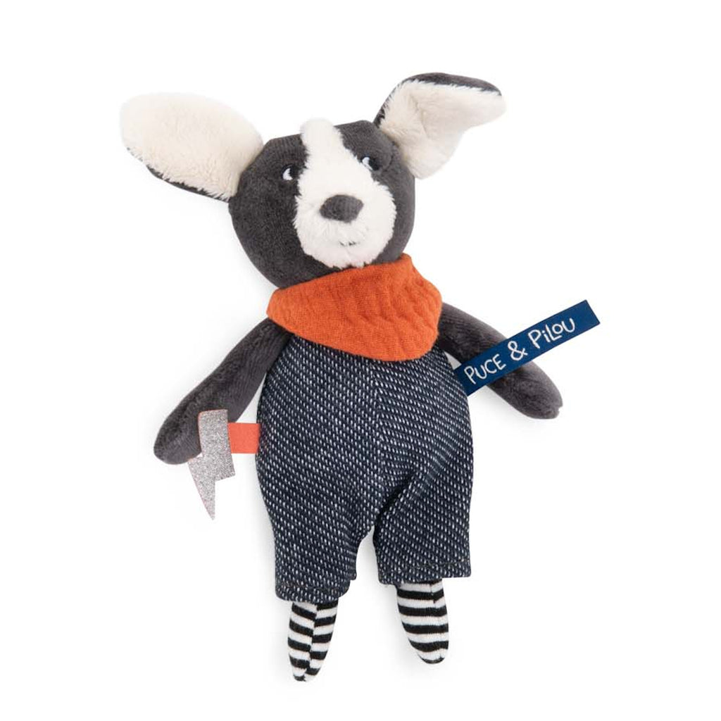 A plush dog toy with dark gray fur, large floppy ears, an orange scarf, and blue pants. It has striped black and white legs, exuding a playful vibe.