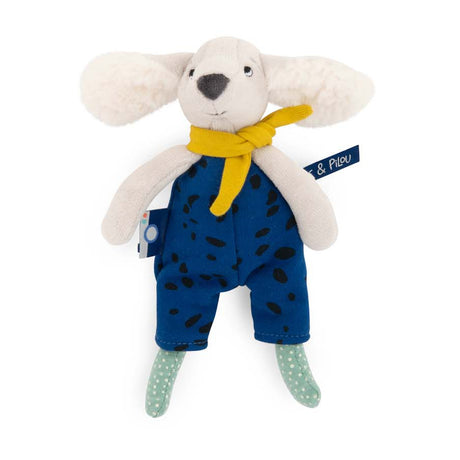 Puce & Pilou small plush dog wearing blue spotted overalls and a yellow scarf.