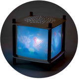 Trousselier Puce et Pilou underwater magic lantern night light projecting starry sky.