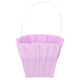 Small purple ruffled crepe paper Easter basket with a thin handle, ideal for party favors and spring celebrations.