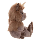 Side profile view of a sitting brown plush horned monster showing its long mane, single horn, and hooved feet.