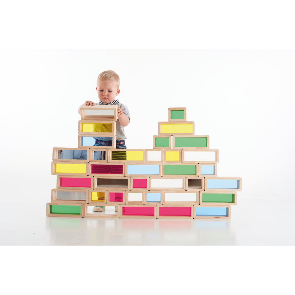 A set of wooden building blocks with translucent colored centers, perfect for construction play, color exploration, and use with light panels.
