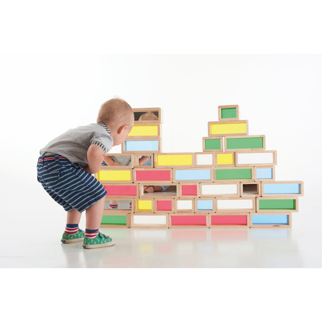 A set of wooden building blocks with translucent colored centers, perfect for construction play, color exploration, and use with light panels.