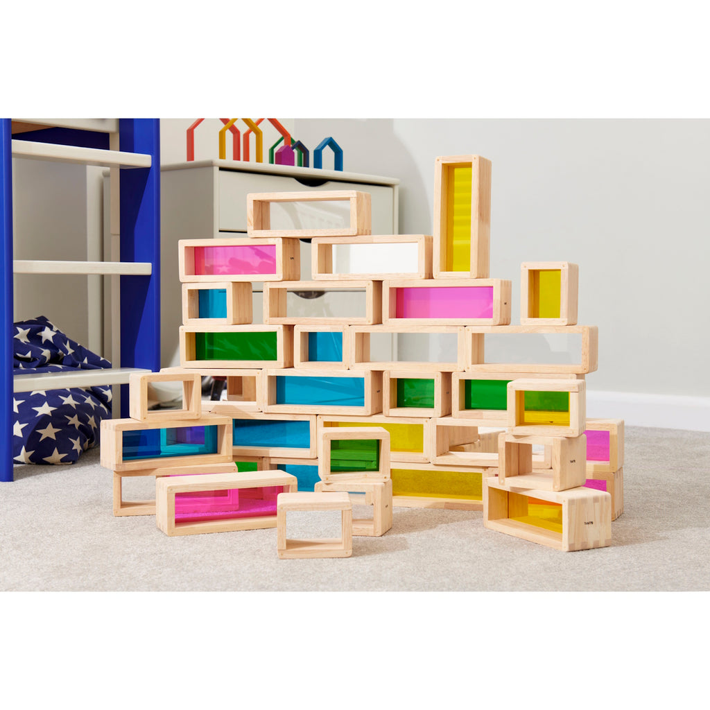A set of wooden building blocks with translucent colored centers, perfect for construction play, color exploration, and use with light panels.