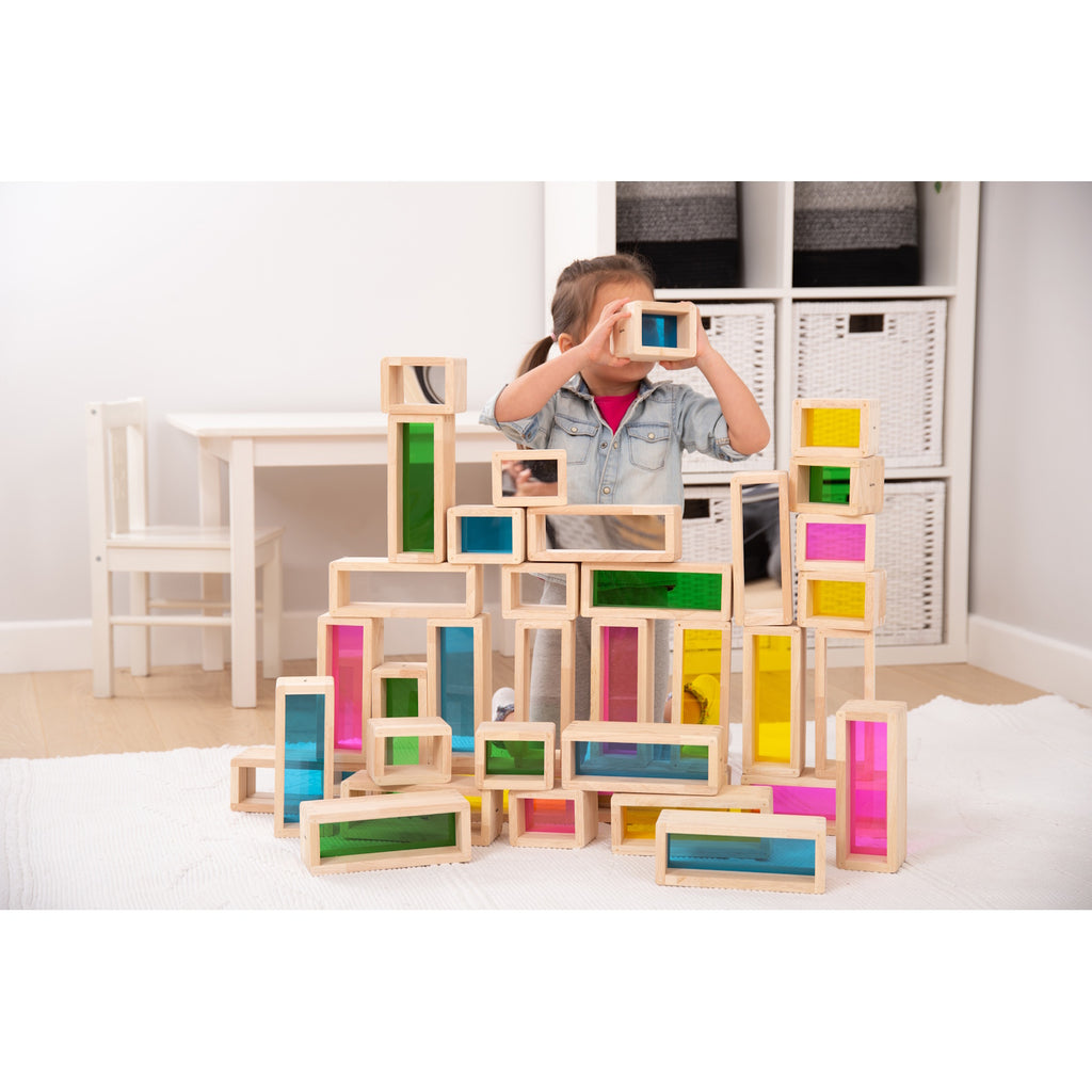 A set of wooden building blocks with translucent colored centers, perfect for construction play, color exploration, and use with light panels.