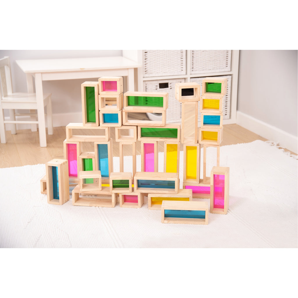 A set of wooden building blocks with translucent colored centers, perfect for construction play, color exploration, and use with light panels.