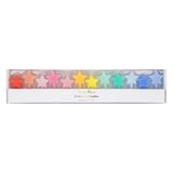 Boxed set of 12 Meri Meri star-shaped birthday candles arranged in a rainbow gradient.