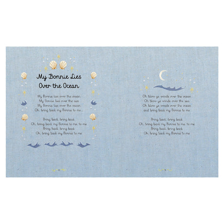 Open book pages with blue linen texture featuring the lyrics to "My Bonnie Lies Over the Ocean" and nautical illustrations.