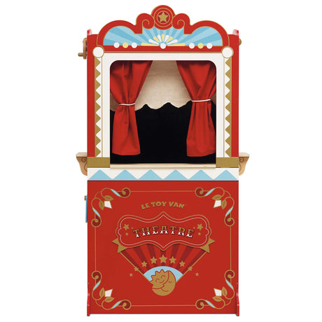 Red vintage-style puppet theater with a ticket booth. Features ornate decorations, star motifs, and red curtains. Charming, playful, and nostalgic.