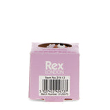 Pink box with "Rex London" branding, item number, and barcode. A cartoon dog's eyes peek out from the top, adding a playful touch.