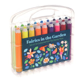 A plastic case contains 18 colorful felt tip pens titled "Fairies in the Garden." The label features vibrant fairy and flower illustrations. Bright and playful tone.
