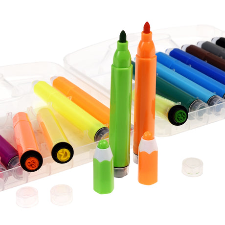 Colorful markers stand upright in open cases. Bright green and orange markers with caps off are central, while other markers lay flat, highlighting creativity.