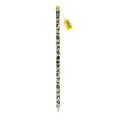 A pencil with dinosaur patterns in green and brown on a beige background, featuring a yellow eraser and an attached yellow sharpener. The tone is playful.