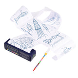 A rolled-out coloring paper features space-themed illustrations, including rockets, astronauts, and planets. A colorful pen lies beside the box.