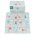 Puzzle featuring dancing mice in red outfits on a pale blue background. The box, labeled “Mimi & Milo,” showcases playful and joyful vibes.