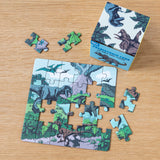 Rex London Prehistoric Land 24-piece mini jigsaw puzzle for kids with dinosaur illustrations and matching box.