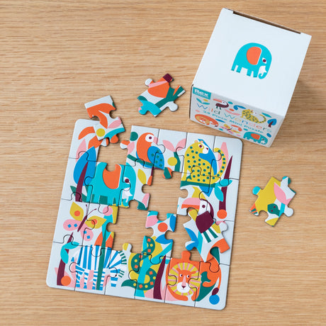 Rex London Wild Wonders 24-piece mini jigsaw puzzle and box featuring colorful jungle animal illustrations.
