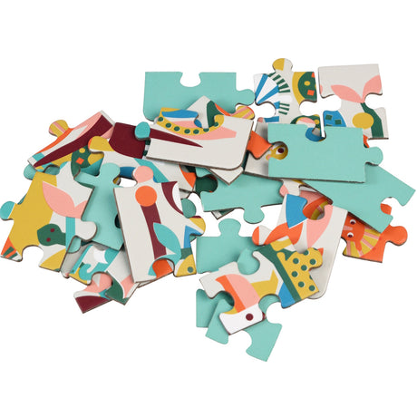 Colorful Wild Wonders 24-piece mini jigsaw puzzle pieces scattered on a white background for kids' educational play.
