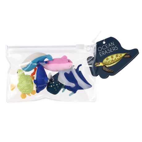 A clear zippered pouch contains colorful ocean-themed erasers, including a turtle and fish. A tag labeled "Ocean Erasers" with a turtle image is attached.