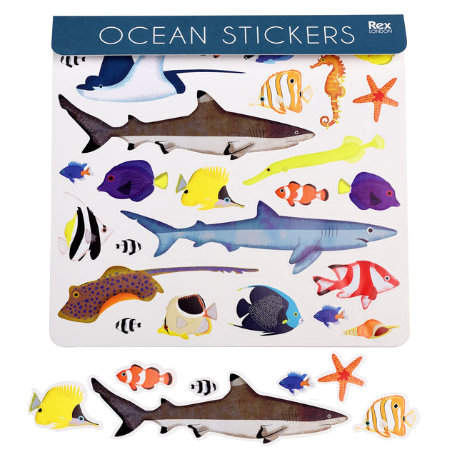 A sheet of colorful ocean stickers featuring various sea creatures, including sharks, tropical fish, a seahorse, and a starfish, set against a white background.