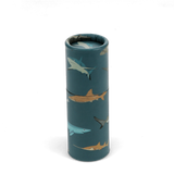 Closed shark-patterned cardboard pencil tube against a plain black background.