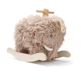 Plush woolly mammoth rocking horse toy with wooden base.