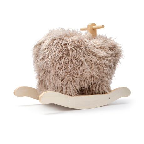 Plush fuzzy mammoth rocking horse toy with a wooden base and handles.
