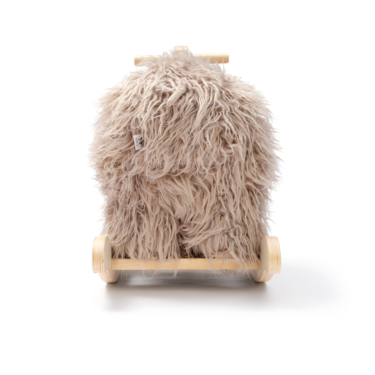 Plush beige woolly mammoth rocking horse toy with wooden base and handles, back view on white background.