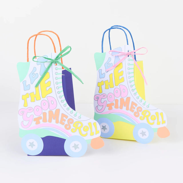 Retro roller skate gift bags with "Let the Good Times Roll" text, ideal for 70s disco or roller skating party favors.
