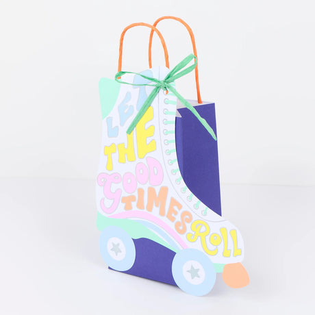 Roller skate gift bag with "Let the Good Times Roll" text, colorful retro design, and orange handles for party favors.