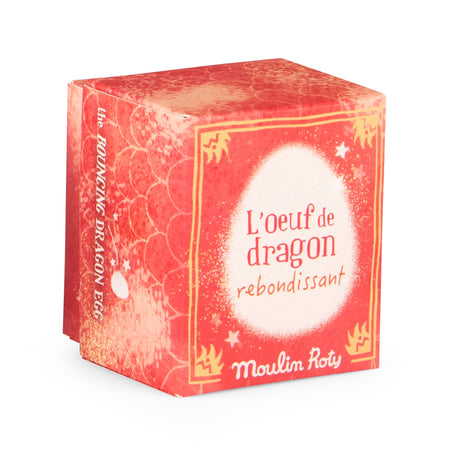 Moulin Roty bouncing dragon egg toy packaging in red and pink.