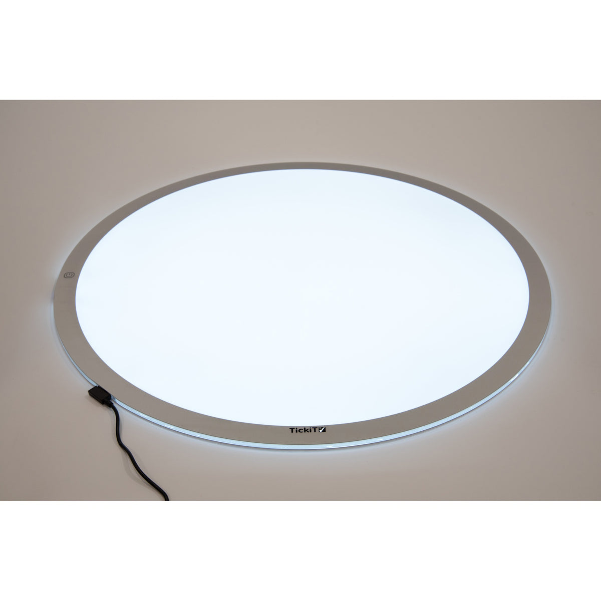 A circular LED panel with adjustable brightness and color-changing options, ideal for sensory play, color exploration, and interactive learning.