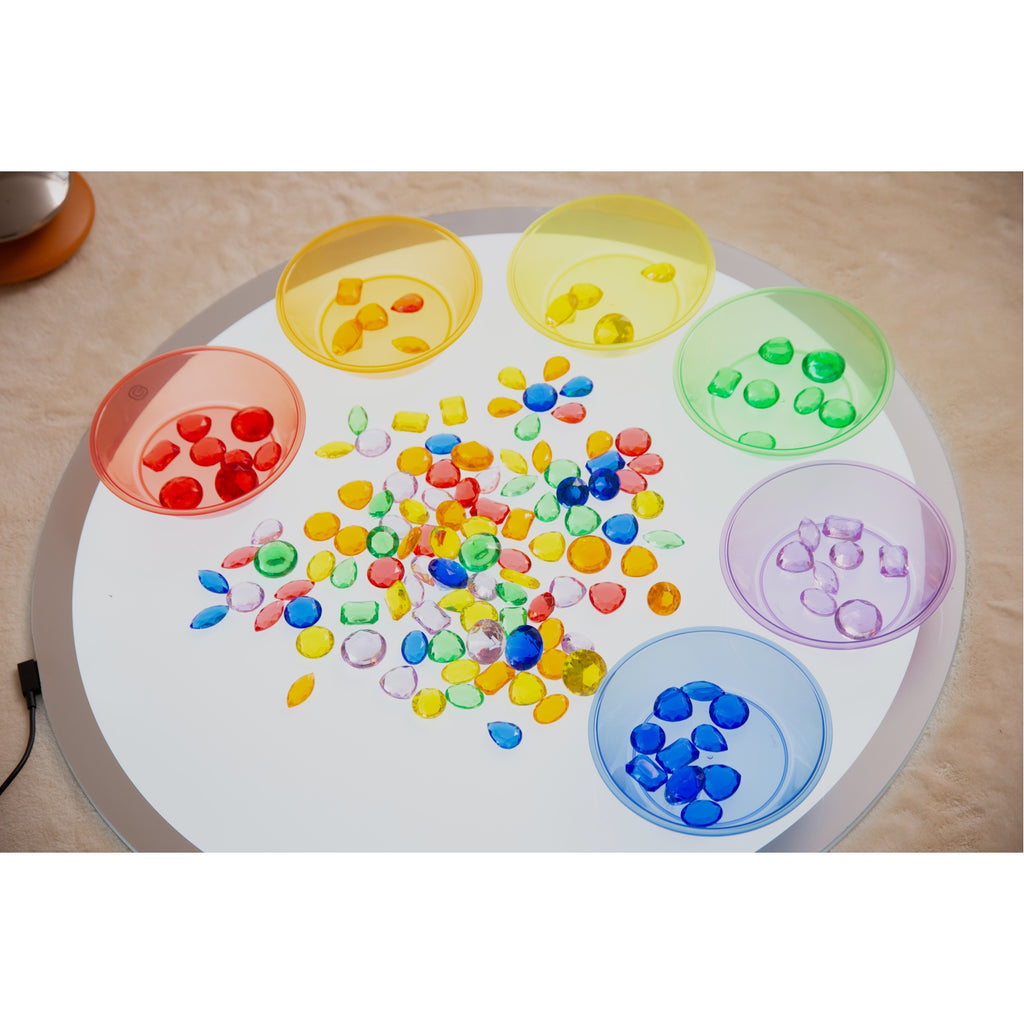 A circular LED panel with adjustable brightness and color-changing options, ideal for sensory play, color exploration, and interactive learning.