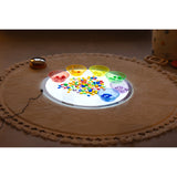 A circular LED panel with adjustable brightness and color-changing options, ideal for sensory play, color exploration, and interactive learning.