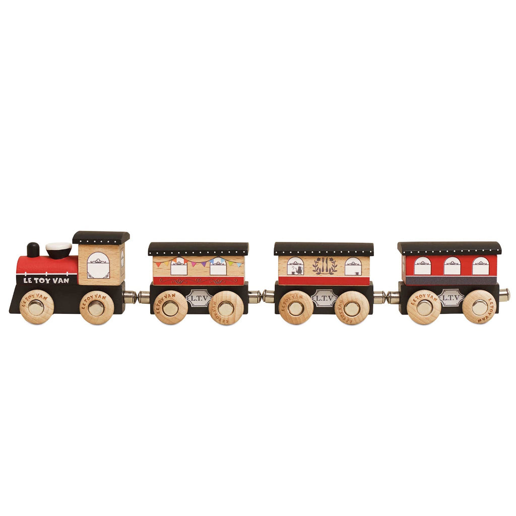 Wooden toy train with a red engine and three brown cars. Each car has detailed window decals and wooden wheels, evoking a playful, vintage charm.