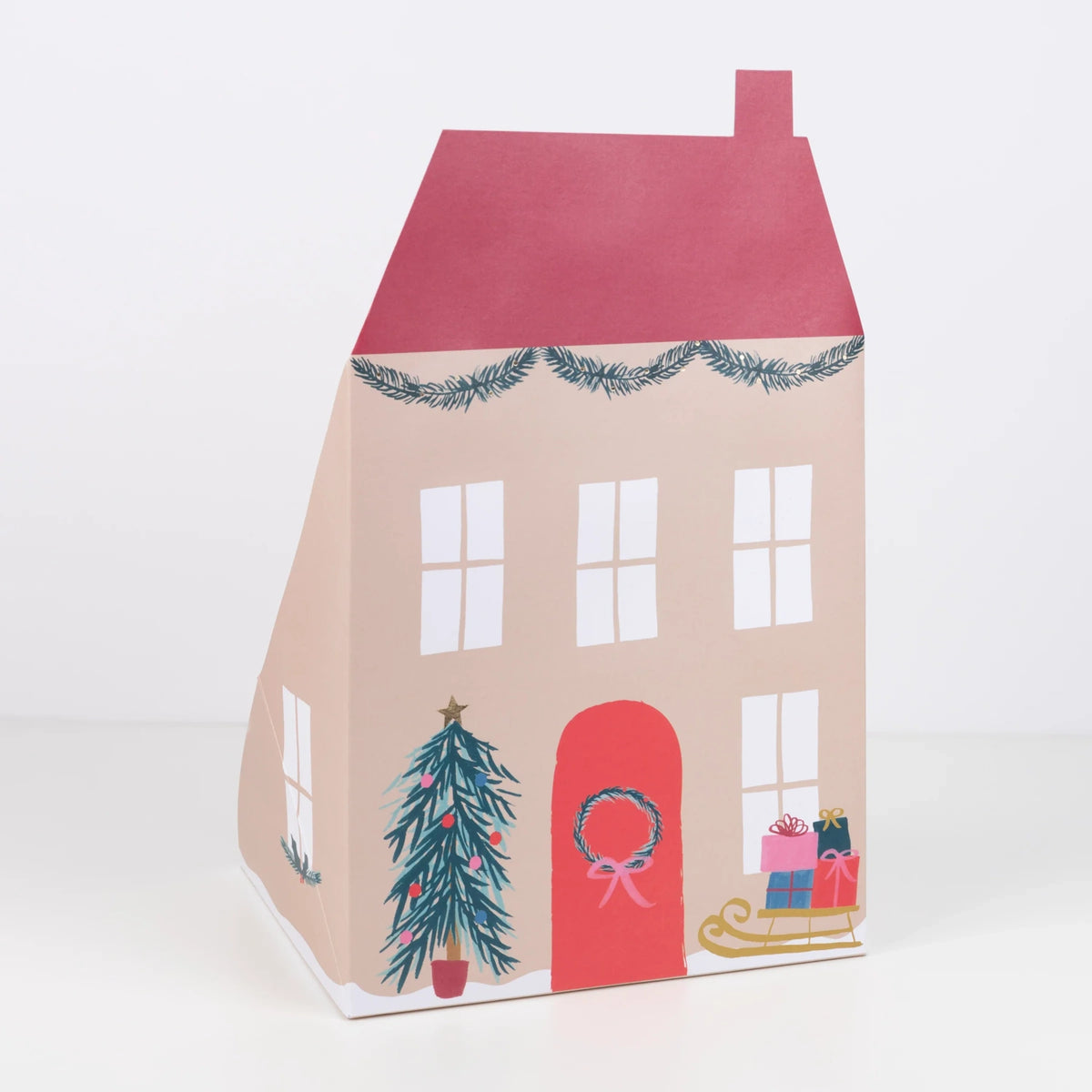 Closed Santa's house pop-up advent calendar featuring a red roof and painted house exterior.