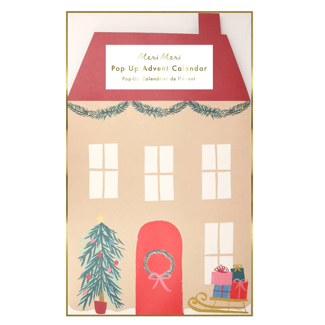 Meri Meri Pop Up Advent Calendar packaging displaying house illustration with Christmas decor.