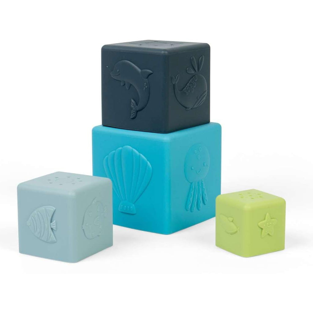 Four colorful stacking blocks with embossed sea life designs, including a dolphin, whale, shell, jellyfish, fish, and star. Playful and educational.